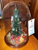 Miniature beaded Christmas tree in dome