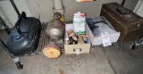 Contents of shelf - radio, paint brushes, tire inflator