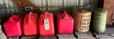 4 gas cans & 2 rolls of baler twine