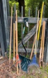 rakes, snow shovel, post digger, pole saw