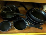 Drawer w/ cast iron skillet & misc. skillets