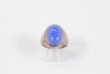 10.71 gram sterling silver gents ring set with 12 x 18 mm oval blue synthetic stone