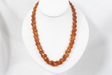 Approx 52 inch strand 7 x 5mm amber beads