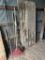 Barn door and long handled tools