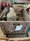 Milk crate containing glass jug