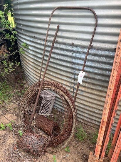 Partial rolls of barbed wire and #9 wire