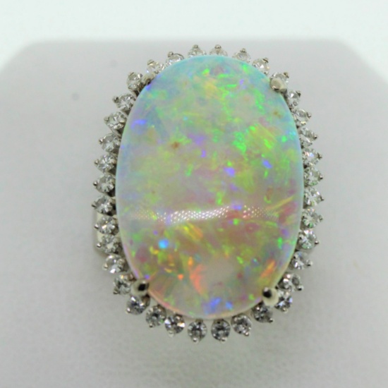 EXCEPTIONALLY FINE 8.68 CT OPAL WITH DIAMOND ACCENT RING