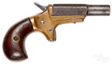 Brass frame muff pistol