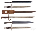 Three bayonets and scabbards