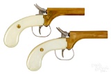 Two Classic Arms Intl. double barrel pistol