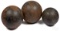 Three cast iron cannon balls