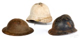 Three miscellaneous helmets