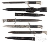 Four German K98 bayonets and scabbards