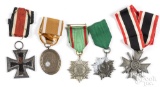 Five German WWII medals, to include an Iron Cross