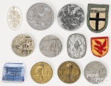 Twelve miscellaneous German WWII tinnies