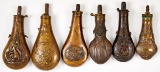 Collection of six brass powder flasks, 19th c.