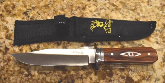 Fixed Blade Elk Ridge Hunting Knife, wood handle with silver colored designs