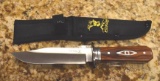 Fixed Blade Elk Ridge Hunting Knife, wood handle with silver colored designs