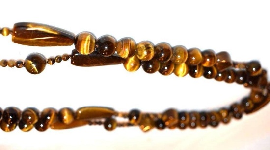 Tiger Eye Carved stone bead necklace, 54 inches around, can loop to make several styles necklace