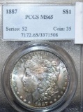 Ex Rare Certified PCGS 1887 U S Morgan Silver Dollar, High Grade MS 65; Firey Rainbow Toning