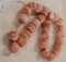 Polished Coral Beads on strand 26 beads