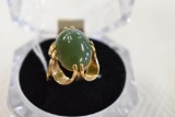 Ladies Gold Open Setting ring with Green Cab Center stone