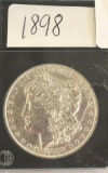 1898 US Morgan Silver dollar, Mirror Shine, Scratch on front, Great Detail on Wings