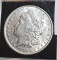 1890 US Morgan Silver Dollar, Full Liberty, Full Details; MS 65 books to $3200