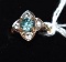 10 K Gold Ladies Ring with Blue Topaz Center Stone, Side Accents