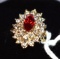 Ladies cocktail ring with red center stone and white accents surrounding, Costume jewelry