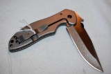 Emerson Knife Design: Kershaw 6034 KAI, finger rest in handle, Thumb rest top of blade, Pkt clip 8