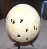 Ornately done, Carved Ostrich Egg with Elephant and baby Elephant Sits on 3 leg horn stand