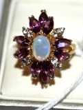 Ladies Cocktail Ring with Opalescent center stone and Purple Accents
