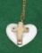 Eskimo Carved Marine Ivory Heart shaped Pendant with Cross on Front