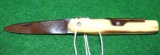 Small ornate pocket knife, marked Courty, Paris Mirror polish blade, appears/celluloid Handle