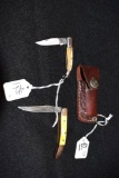 Custom made mini Damascus folding knives, one with leather sheath