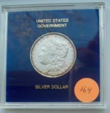 1883-O  Morgan dollar in case