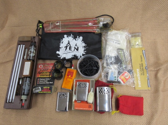 Misc hunting items lot. gun cleaning items, hand warmers and more.