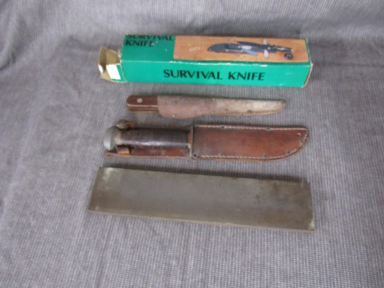 3 fixed blade knives and a sharpening stone.