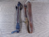 2 rifle slings. 1 leather. 1 braided horse hair.