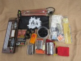 Misc hunting items lot. gun cleaning items, hand warmers and more.