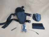 2 holsters, bullet sleeve, ar tool. and more.