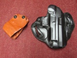2 leather holsters, deSantis black Check six style and a tan