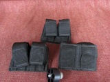 3 double revolver speedloader pouches and a speedloader