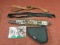 Lot of rifle slings and a pistol soft case.