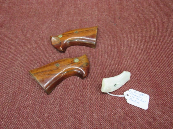 lot of 2 pairs of grips. S&W grips with varnish added.