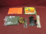 sportsman items, archery armguard, bow strings. vinyl ponchos