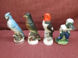 4 glass figurines, 3 birds, 1 go gators, see photos for details