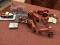 7 Farmall toy die cast tractors, 1 Farmall toy truck and a