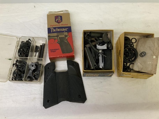 Box lot of gun parts mostly for 1911, 1911 triggers, back straps,